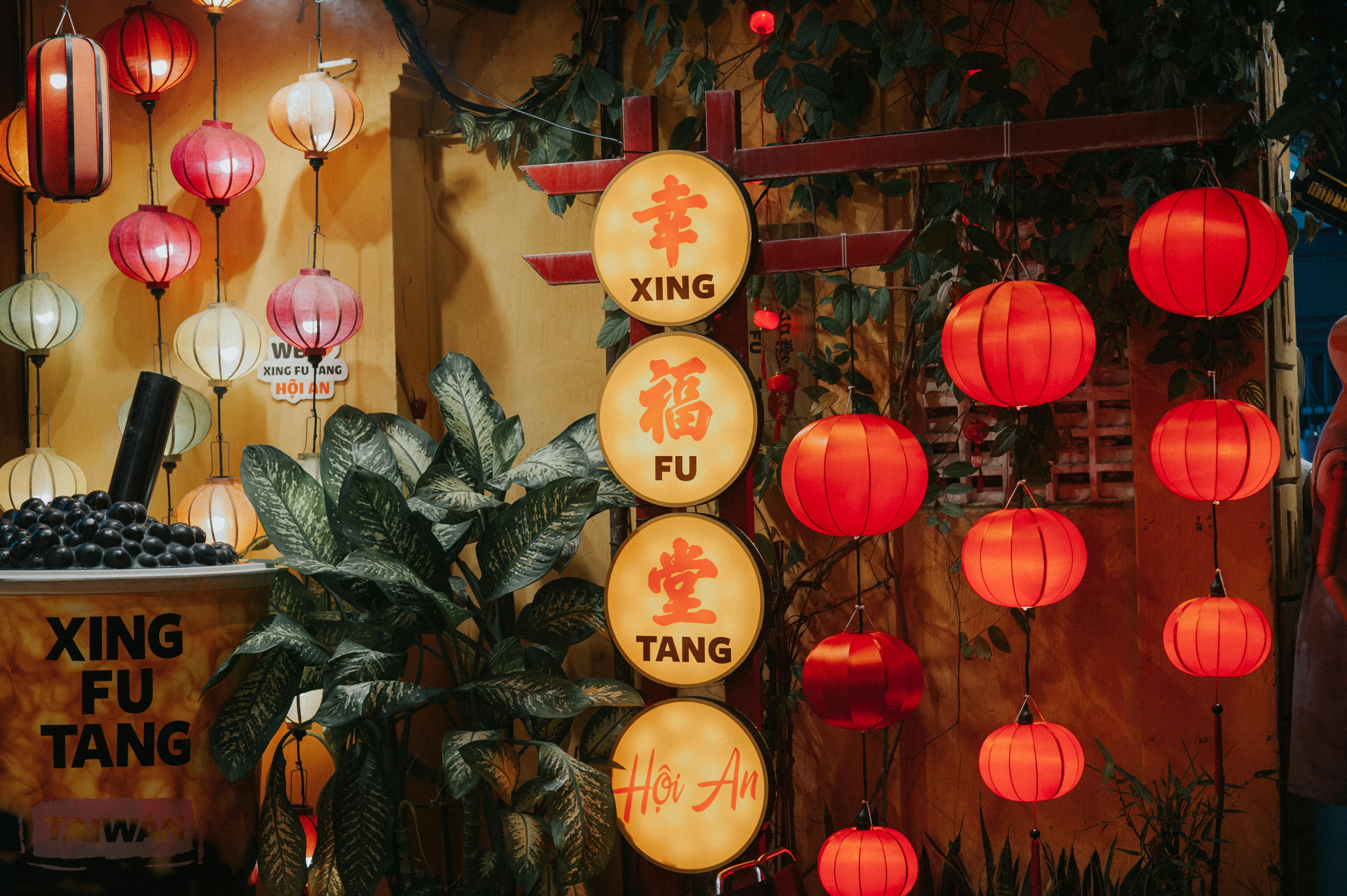 Traditional Lanterns Hanging on Wall · Free Stock Photo