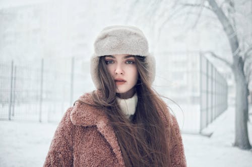 Portrait of Woman in Hat in Winter