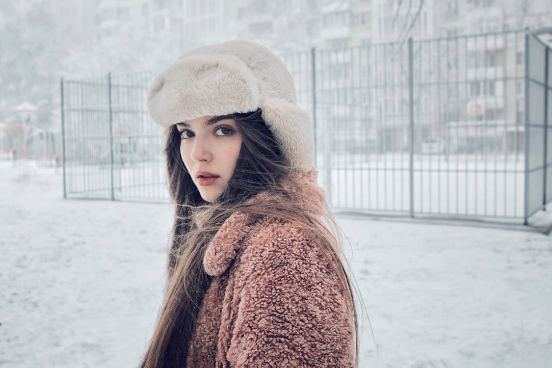 Portrait of Woman in Hat in Winter