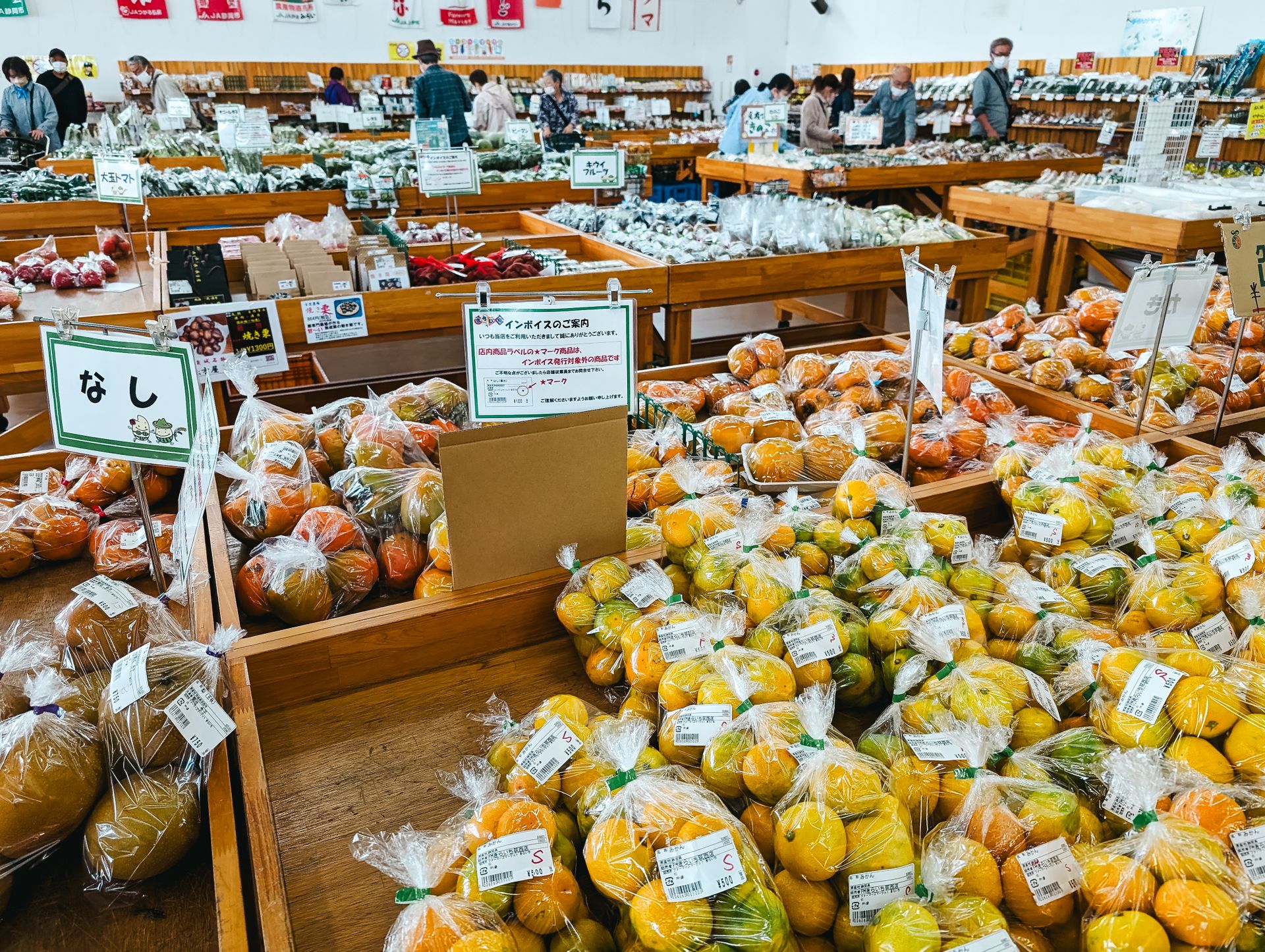 Explore the vibrant Tokyo market showcasing fresh fruits and vegetables in abundance.