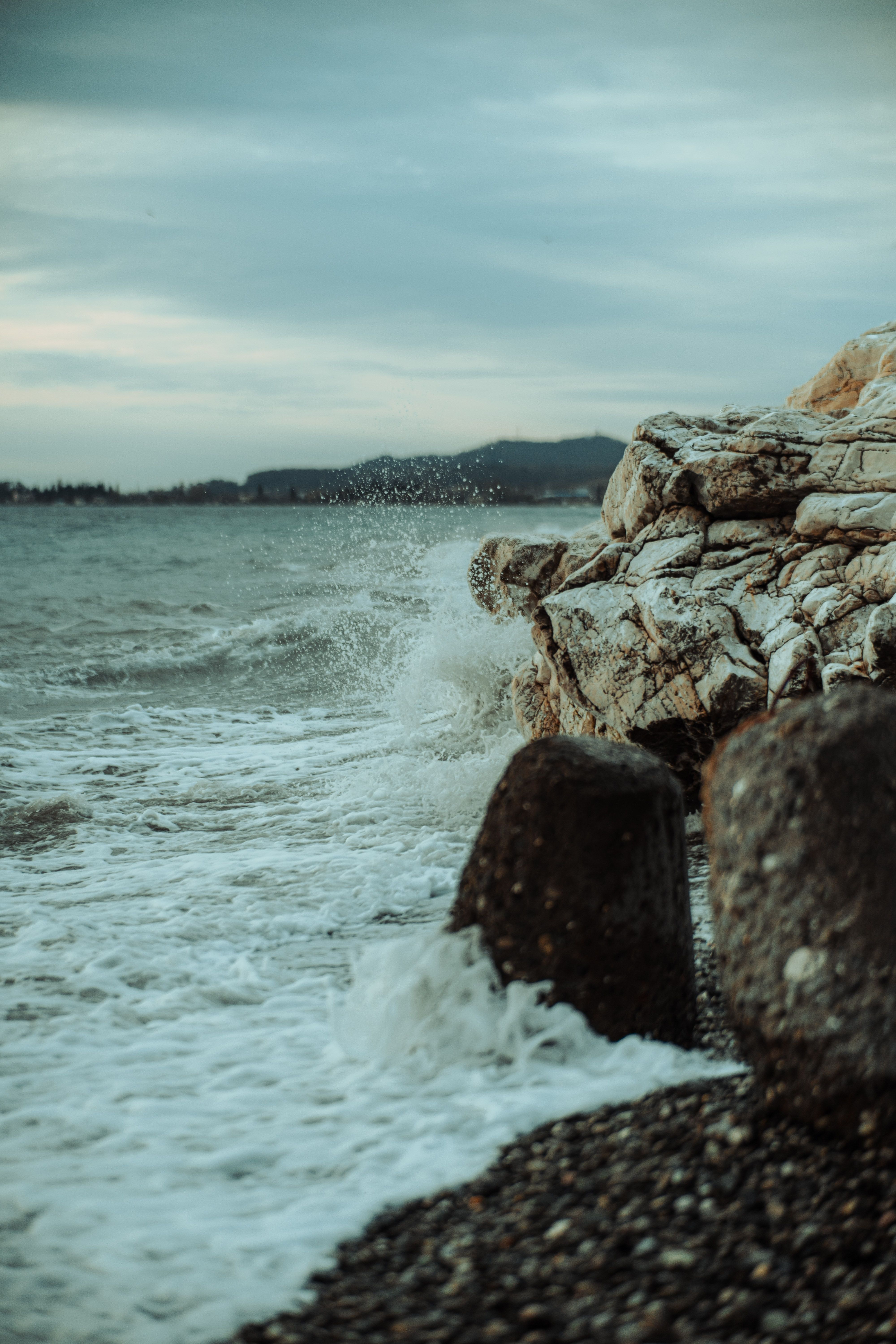 Cliff Rocks on Sea Shore · Free Stock Photo