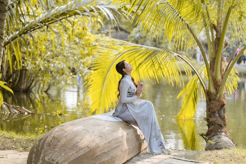 Woman Posing in a Tropical Park