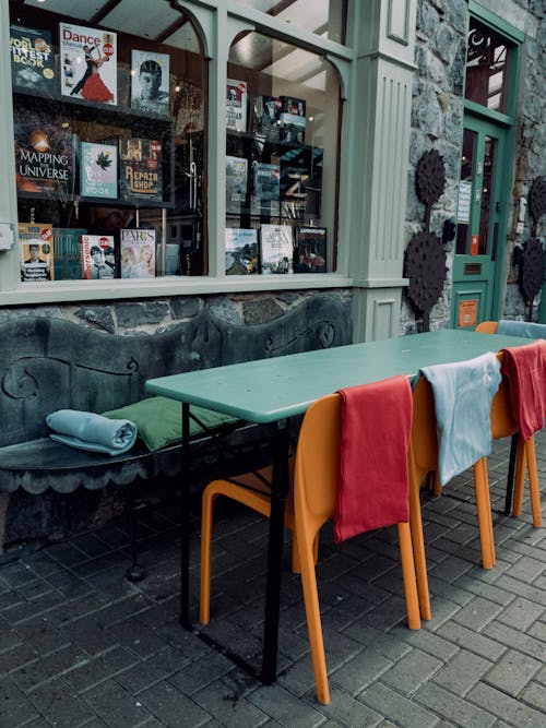 Tables and Chairs in Front of a Restaurant 