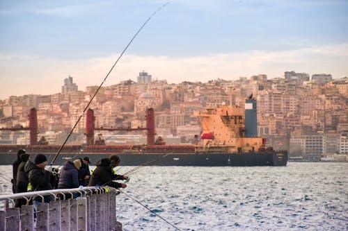 People Fishing in Harbor in Istanbul 