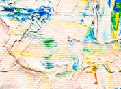 这幅充满活力的抽象绘画特写，以富有纹理的丙烯酸层，展现了富有表现力的色彩