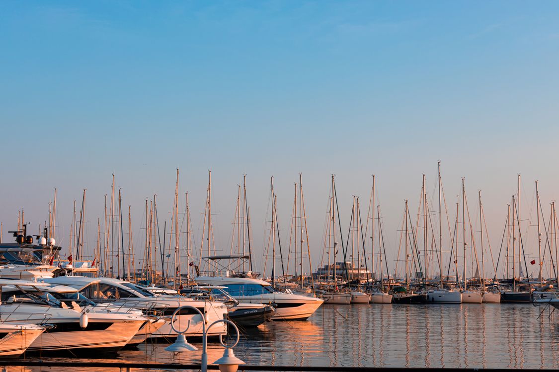 Sailboats and Yachts in the Harbor at Sunset · Free Stock Photo