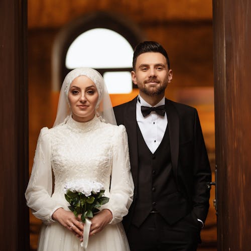 Newlyweds Posing in the Doorway