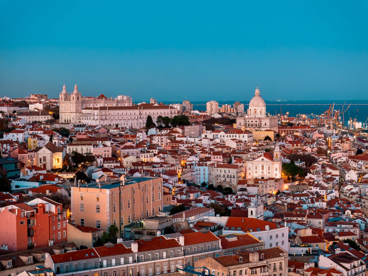 Lisbon rooftops at twilight — photo by Matej Simko on Pexels