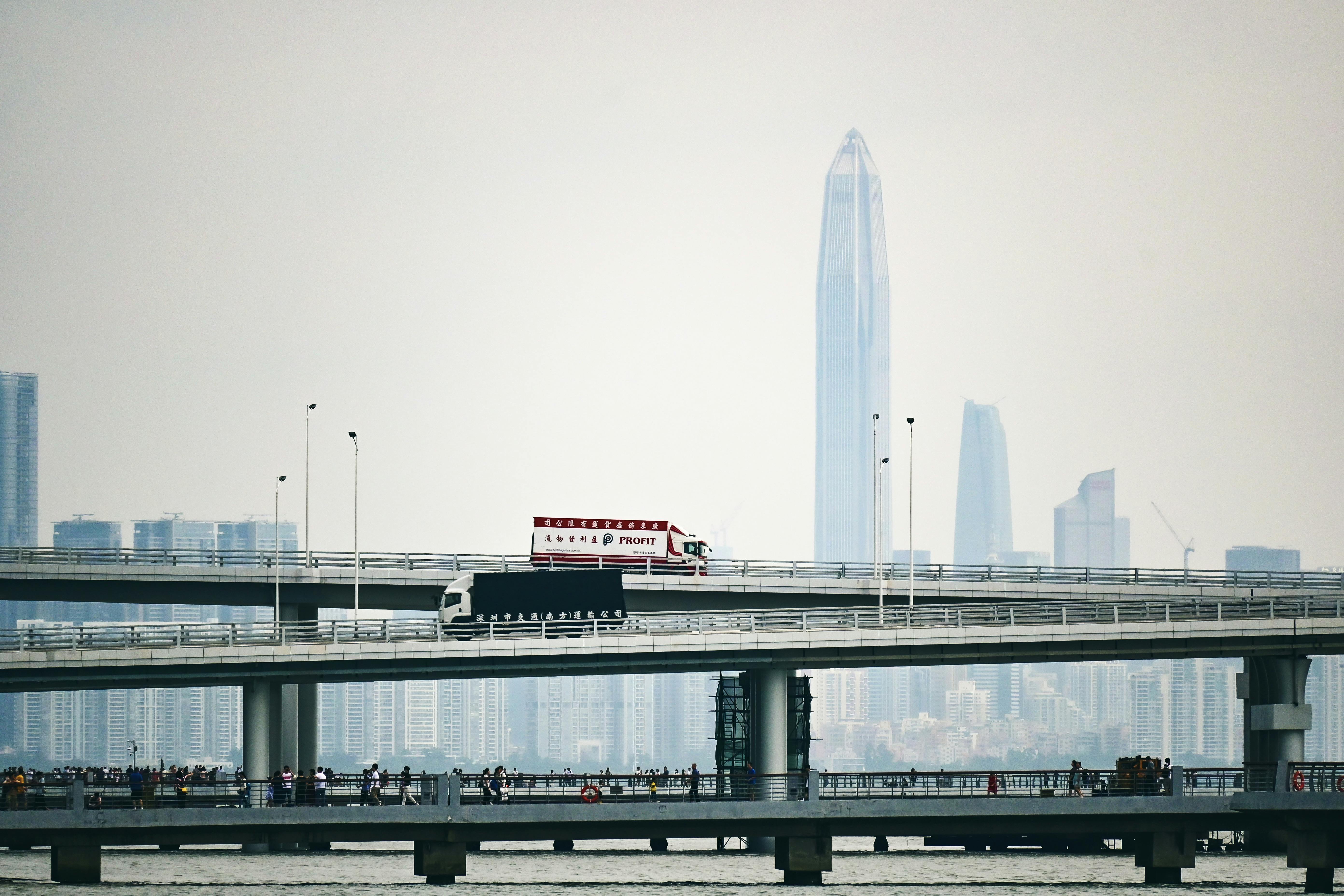 trucks on bridges in city