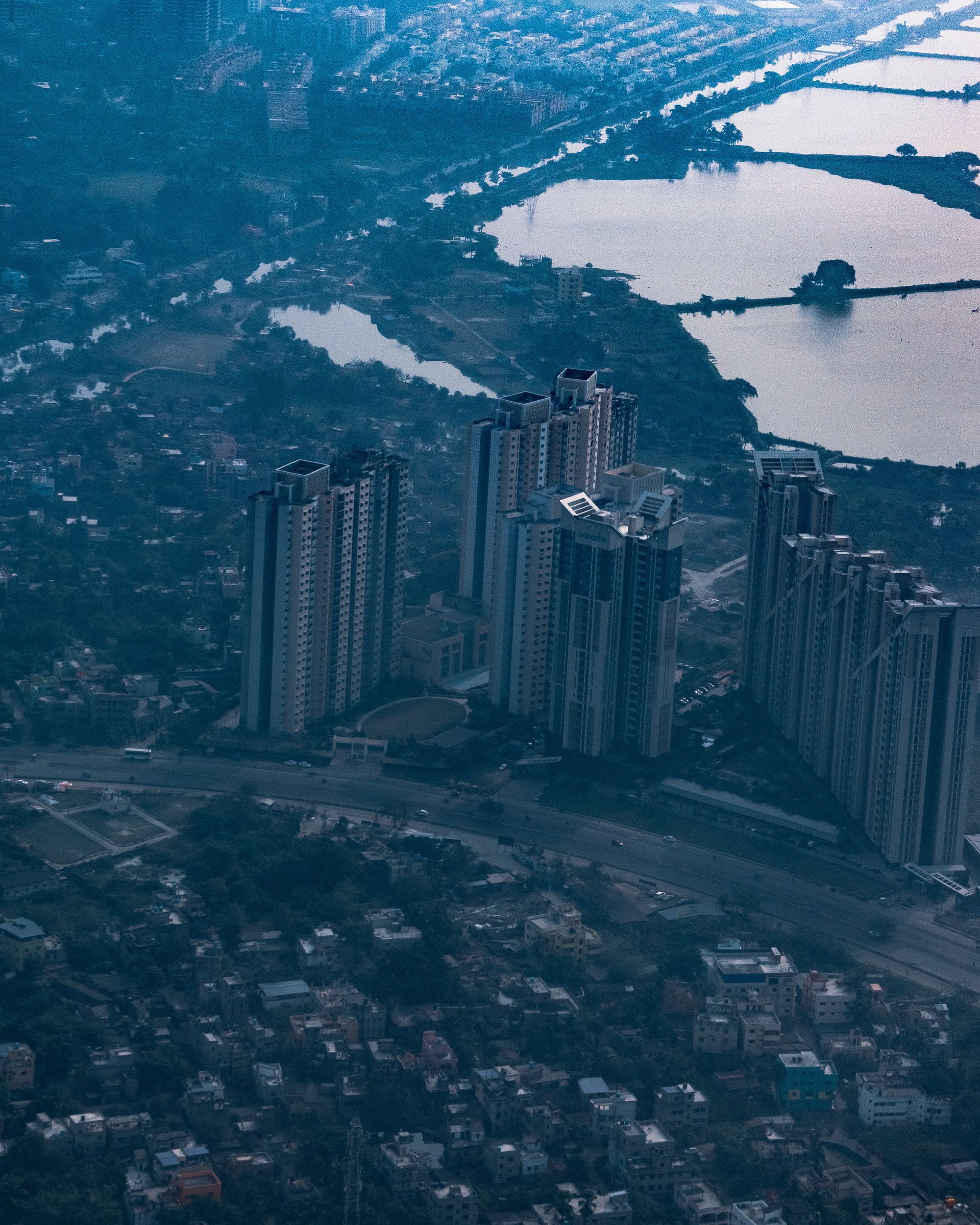 A stunning aerial view capturing the cityscape and architecture of Kolkata at dusk.