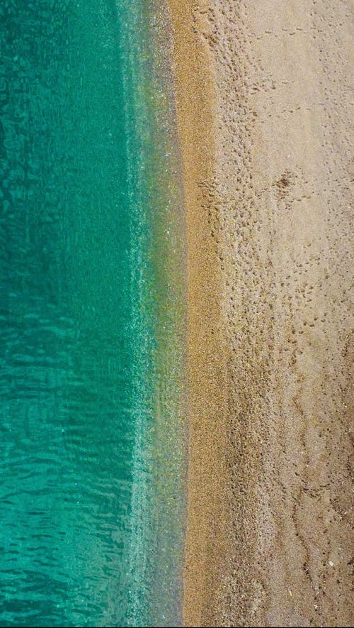 Aerial Photography of an Empty Beach and Sea 