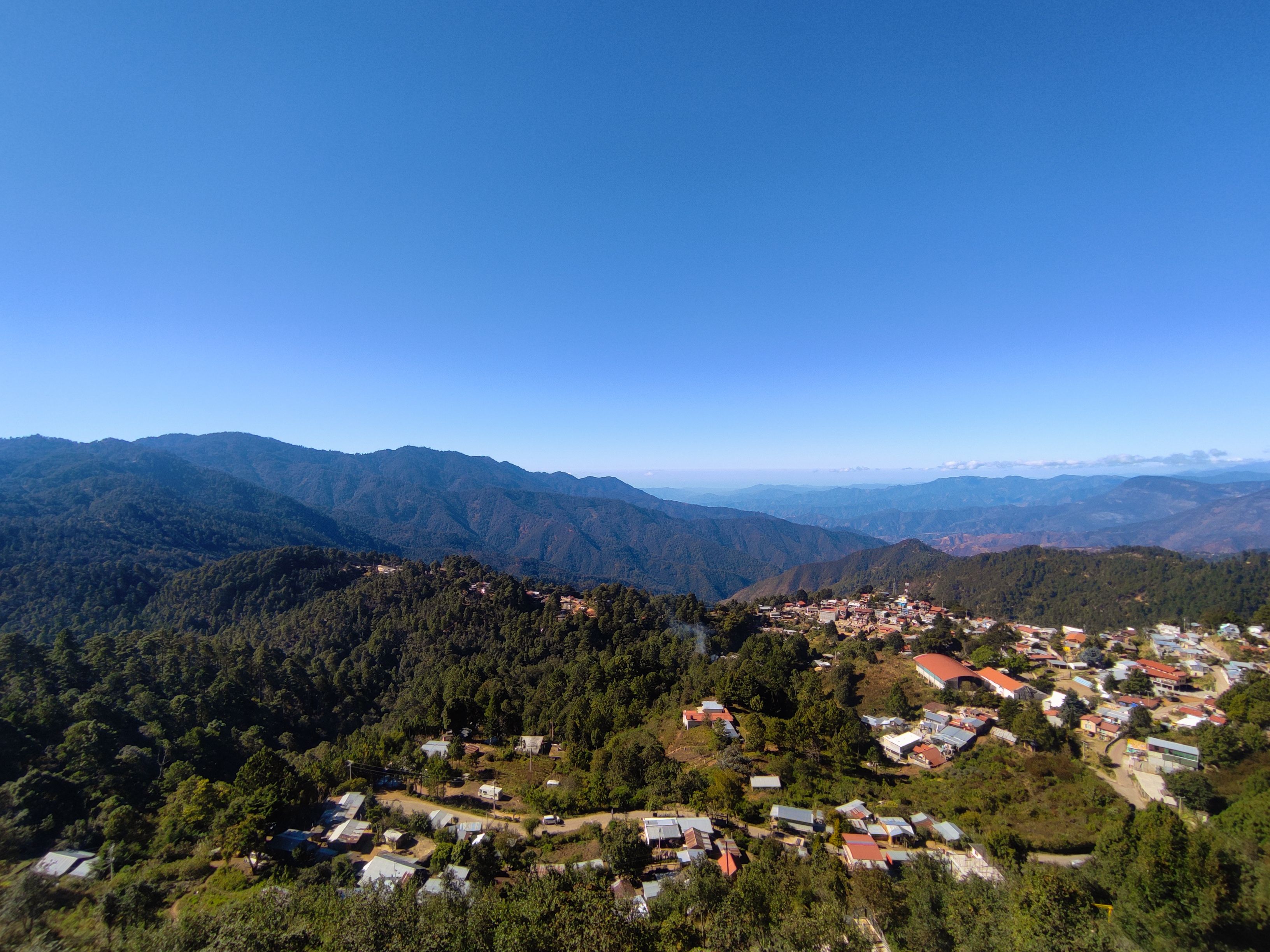 A breathtaking aerial view of San José del Pacífico, nestled in Oaxaca