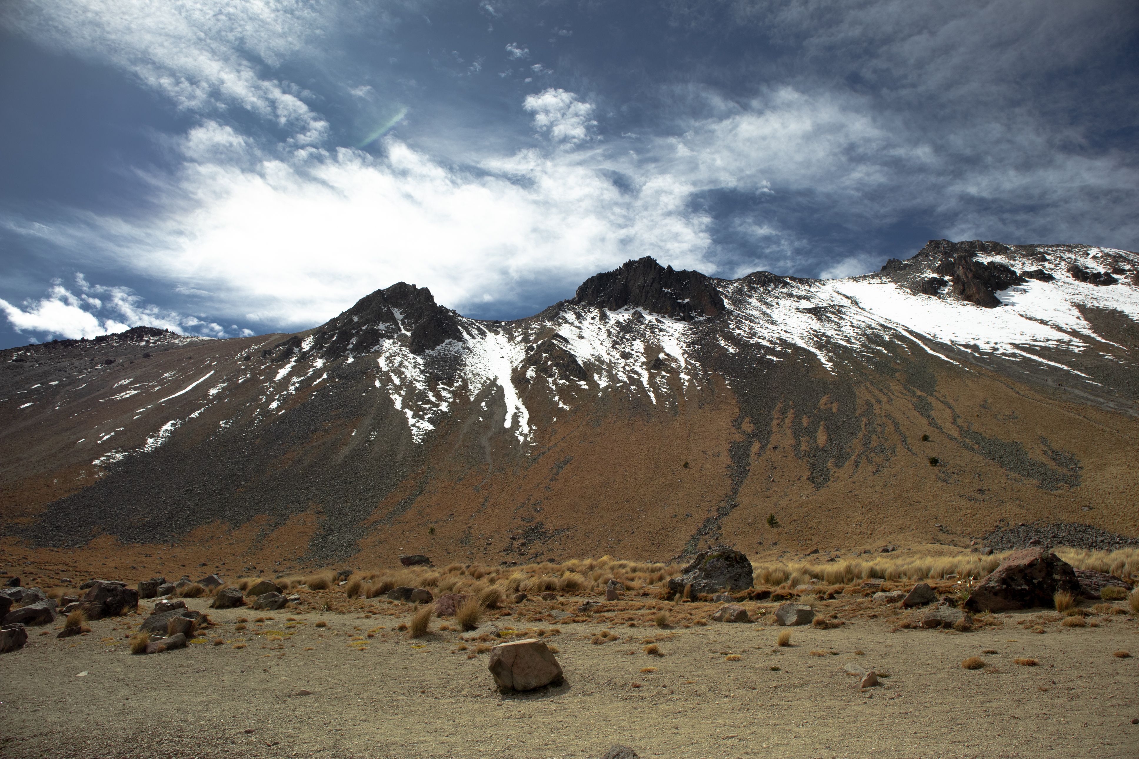 Snow on Volcanic Mountain Range · Free Stock Photo