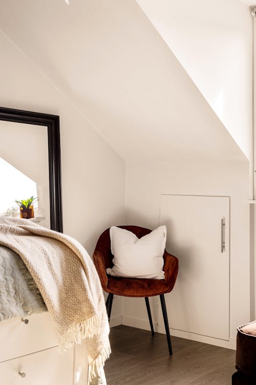 White Room Corner with a Cushion on an Armchair