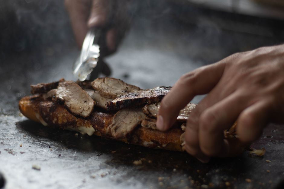 A photo evocative of Sandes de leitão, a Portuguese dish.