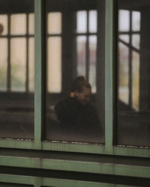 Free Reflective silhouette in a Berlin window with modern architecture feel. Stock Photo