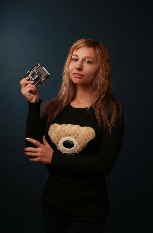 Portrait of Blonde Woman with Camera
