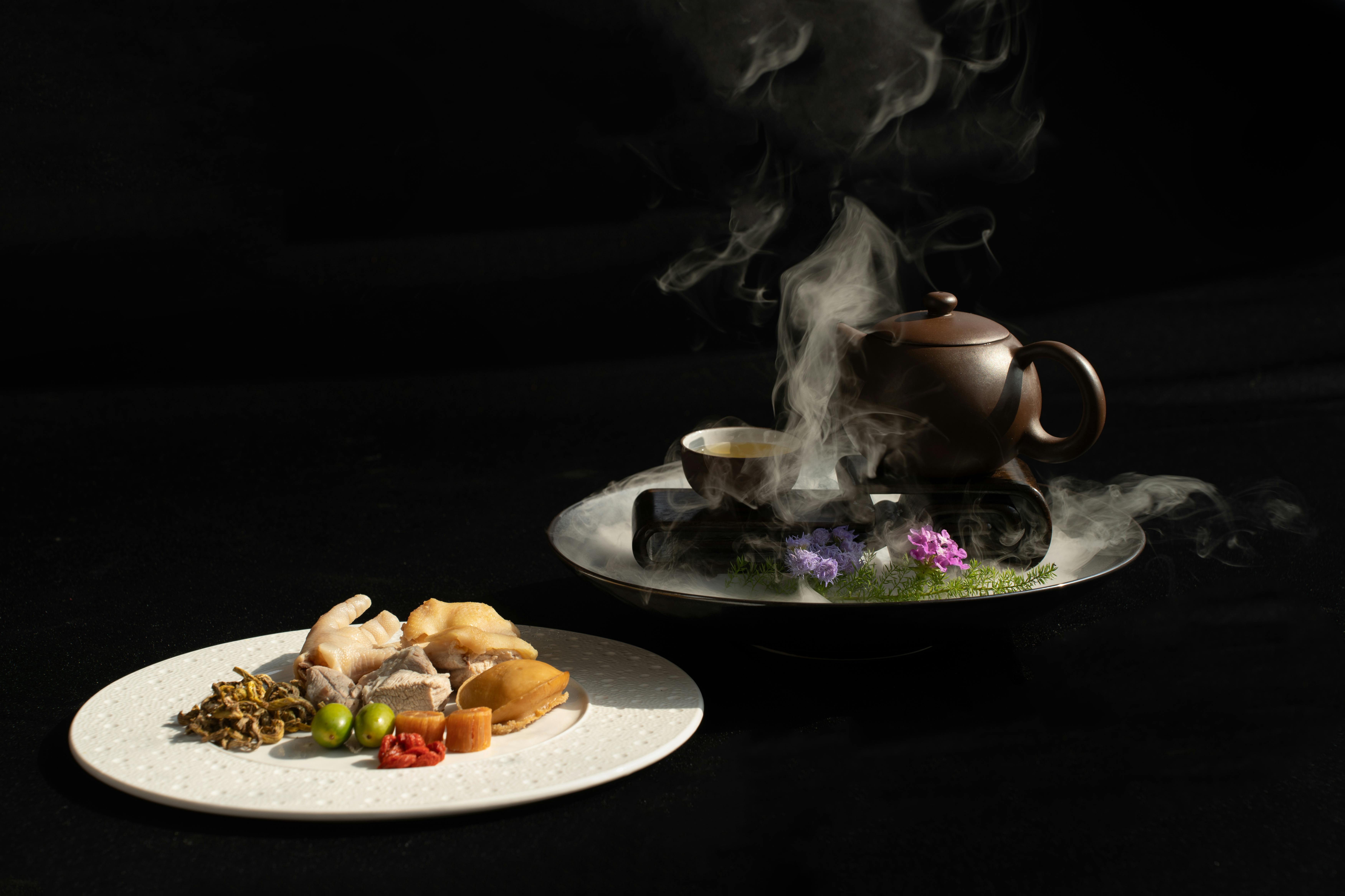A beautifully plated dish on a rooftop table with a blurred city background, showcasing the culinary artistry against the urban backdrop - Chicago rooftop restaurants