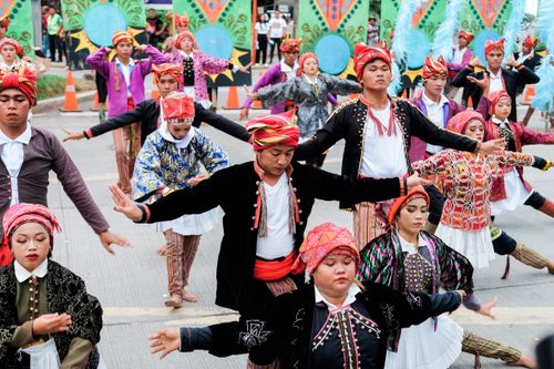 Free Colorful street performance showcasing traditional Filipino dance in Davao City, Philippines. Stock Photo