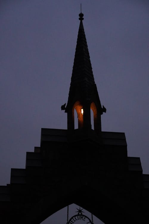 Silhouette of a Tower of a Church at Night 