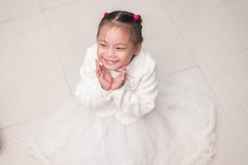Little Girl Wearing White Dress 