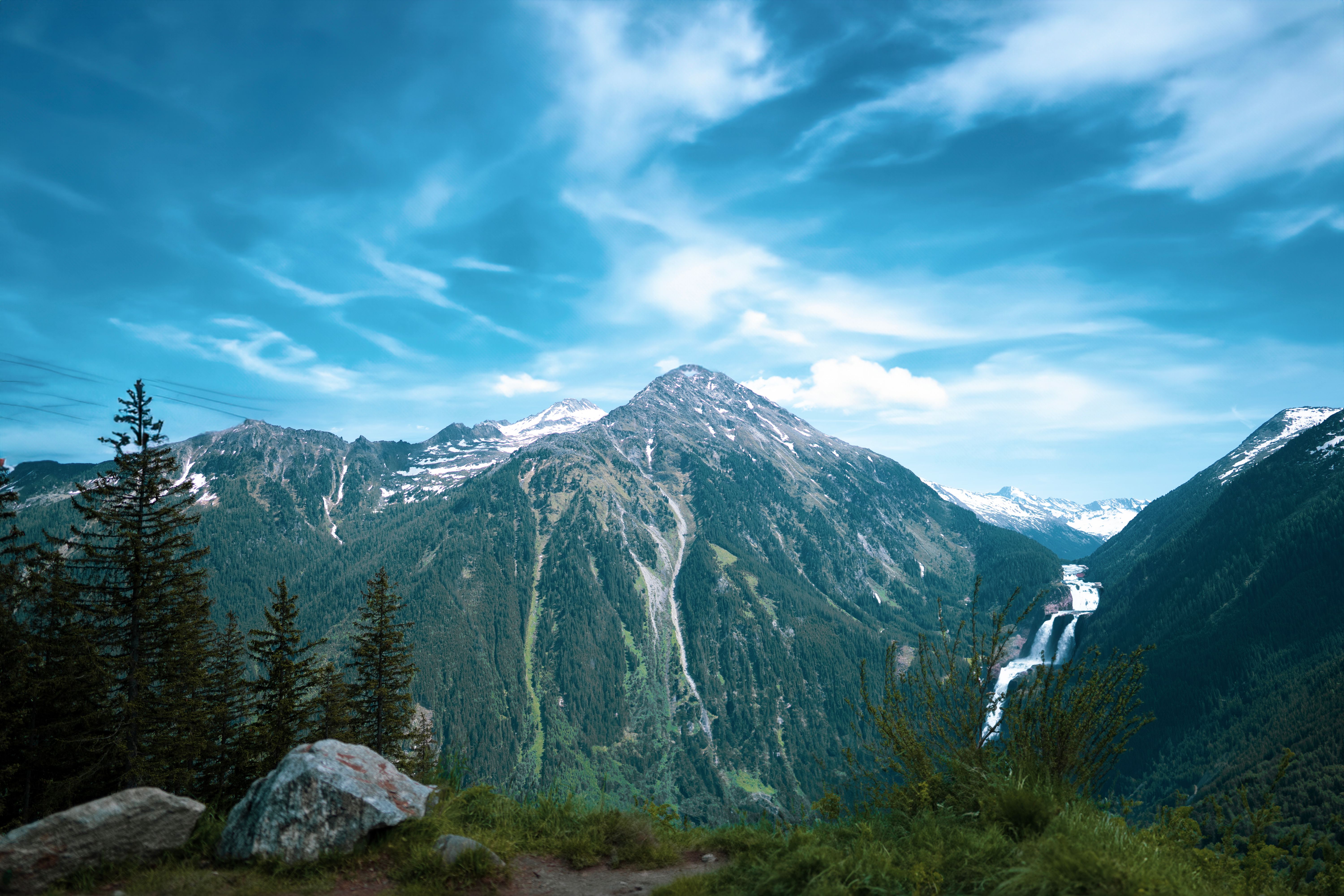Scenic View of Rocky Mountains under Blue Sky · Free Stock Photo