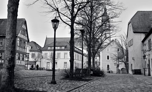 Free Black and white view of a tranquil cobblestone street in Tauberbischofsheim, Germany. Stock Photo