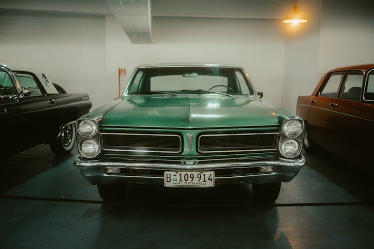 Green Vintage Car In A Garage 