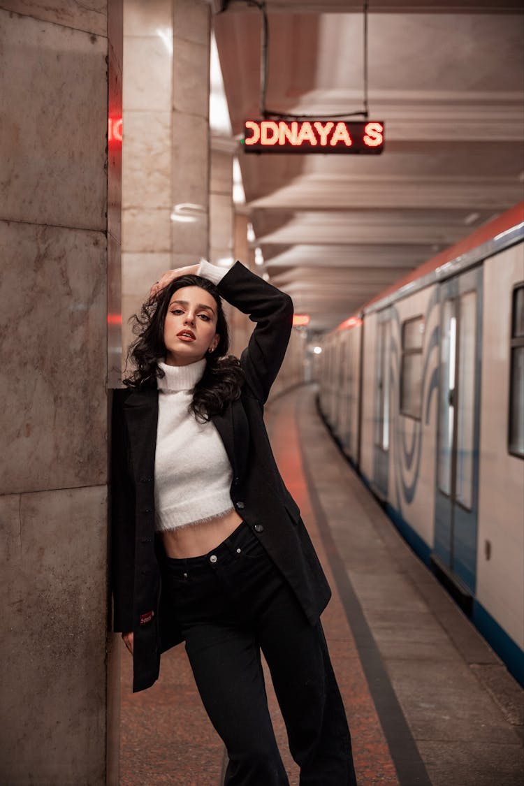 Brunette Woman In Jacket At Metro Station