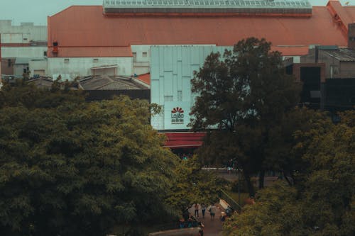 A large building with a large screen on top