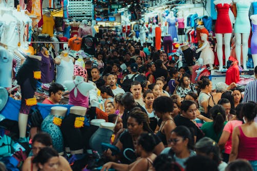 A crowded market with people shopping