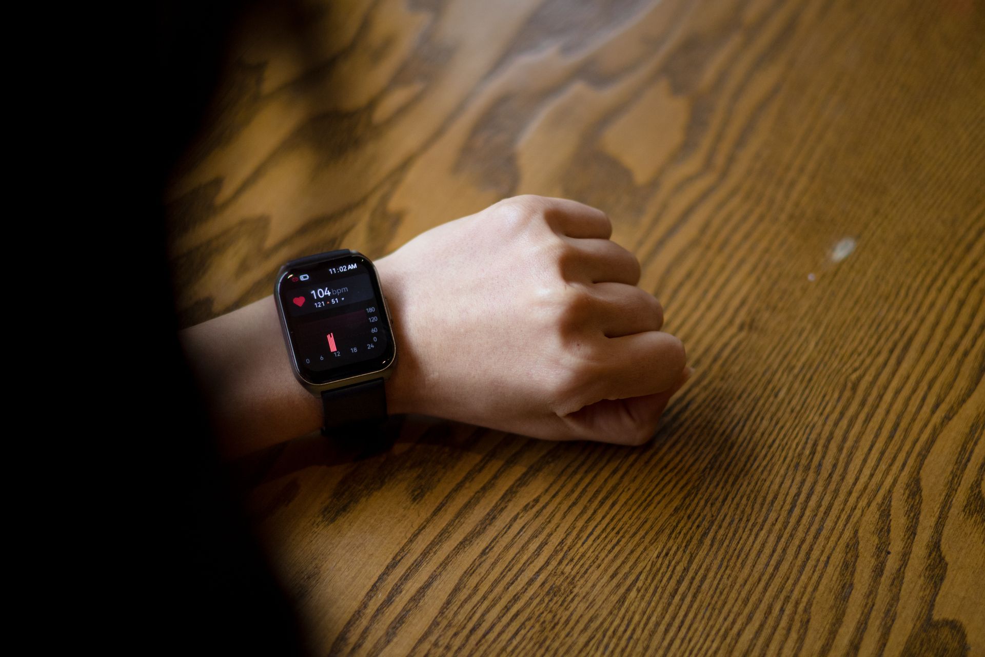 Close-up of a Person Looking at the Pulse Displayed on a Smartwatch