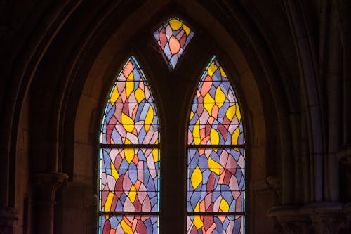 View of a Stained Glass Window in a Gothic Church 