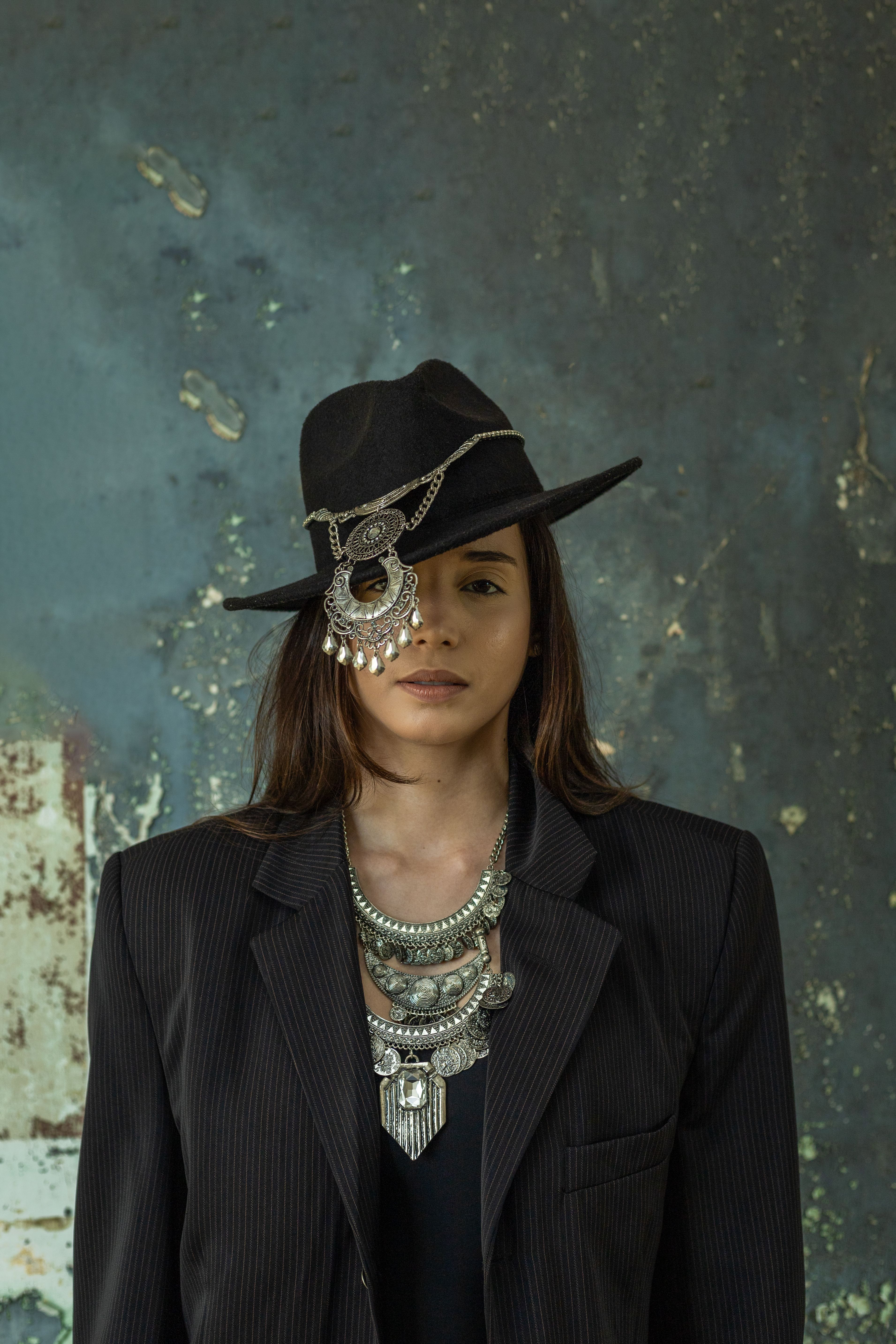 Portrait of Woman in Hat and Black Suit · Free Stock Photo