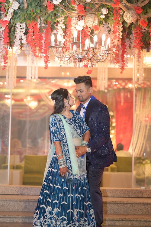 Woman and Man in Traditional Clothing for Wedding