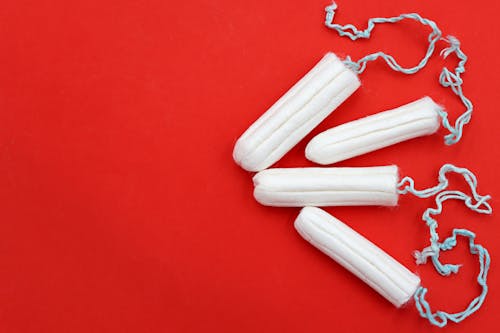 Tampons on Red Background