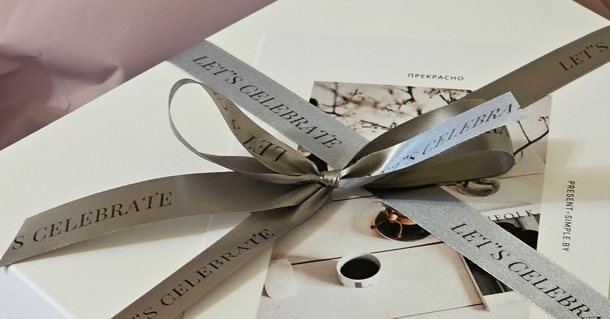 Pprepared Ribbons Gift Box Tied with a Silver Ribbon Prepared by Present Simple · Free ...