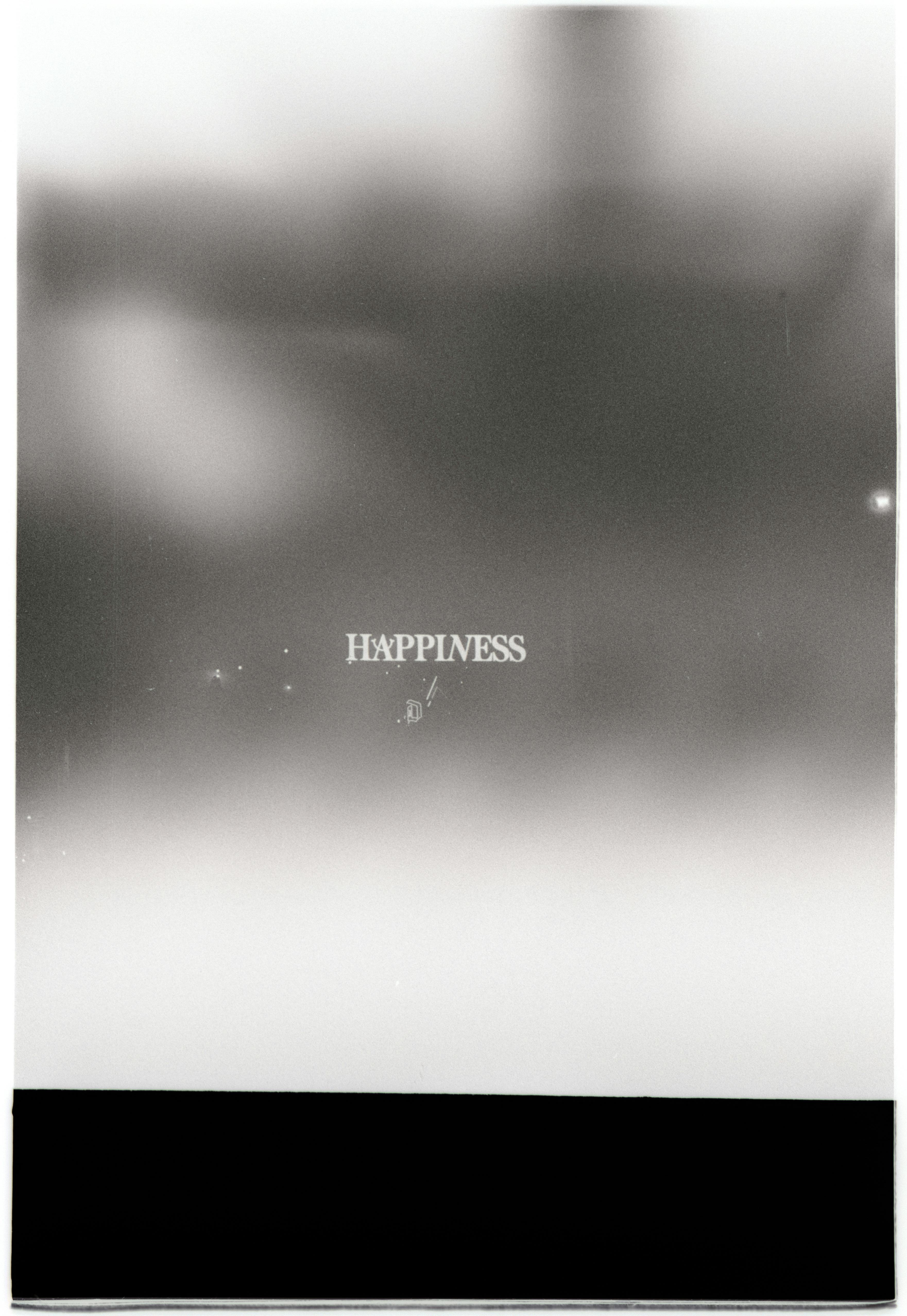 Minimalist black and white image featuring the word 'Happiness' in a stylized, abstract composition.