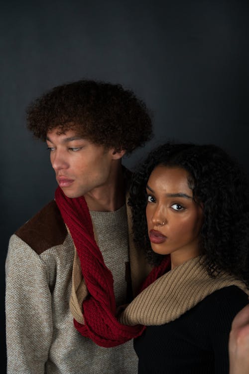 Young Couple with Curly Hair Tied with Scarves