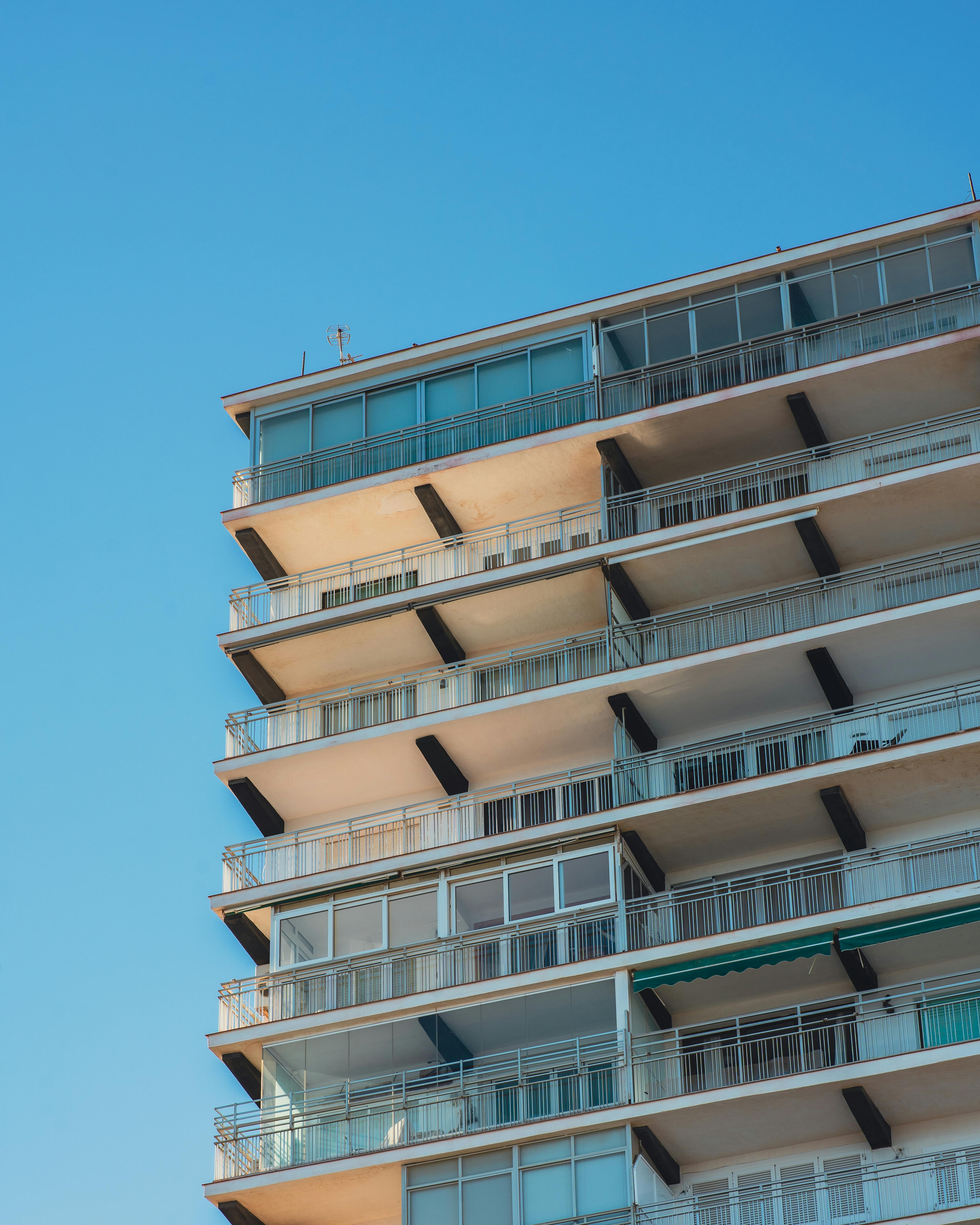 an apartment building with balconies and balconies