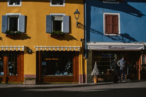 Sunlit Building Wall in Blue and Yellow