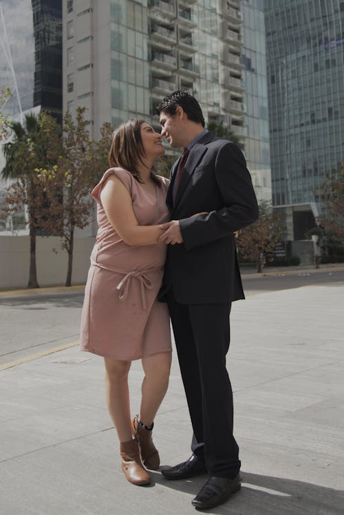 Couple Standing Together and Hugging