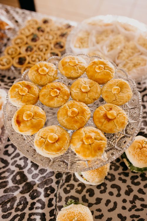 Free A top view of assorted pastries elegantly displayed on a glass stand. Stock Photo