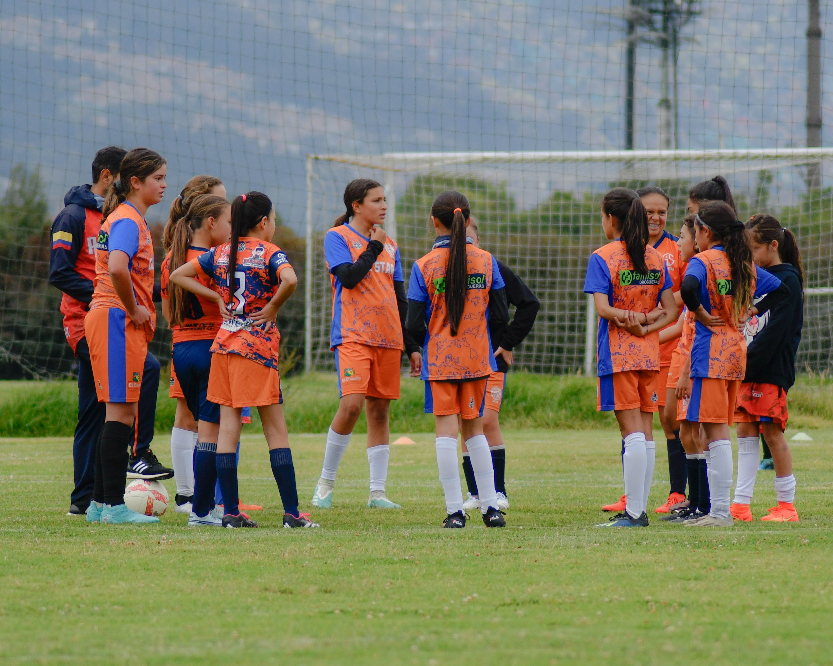 Women Soccer Team on Pitch · Free Stock Photo