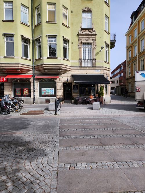 Free Idyllic view of Uppsala's urban landscape with cobblestone streets and colorful buildings. Stock Photo