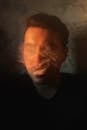 Photo of a Man with Smoke Covering his Face