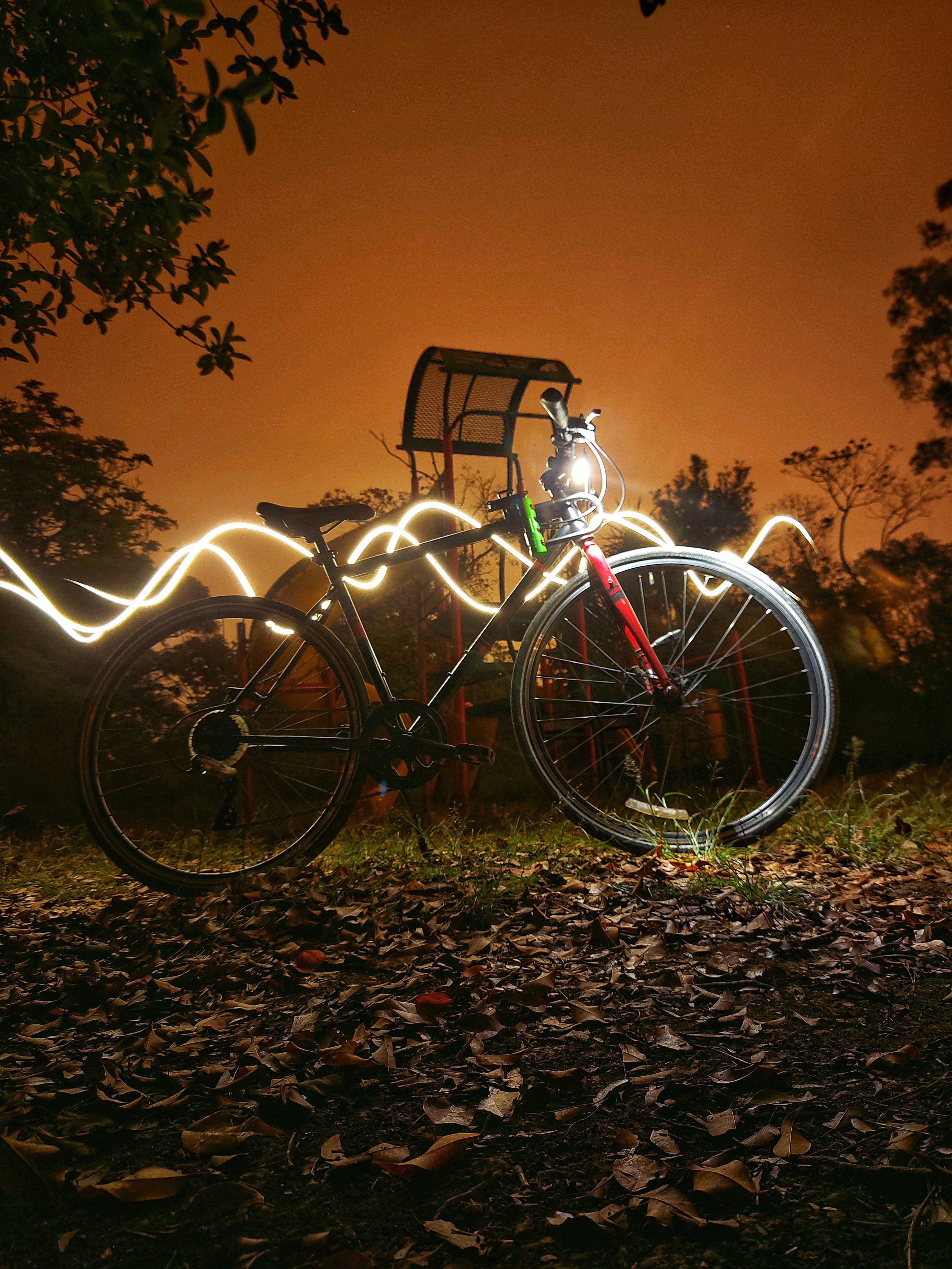 Photo of a Bicycle with Lights at Dusk · Free Stock Photo
