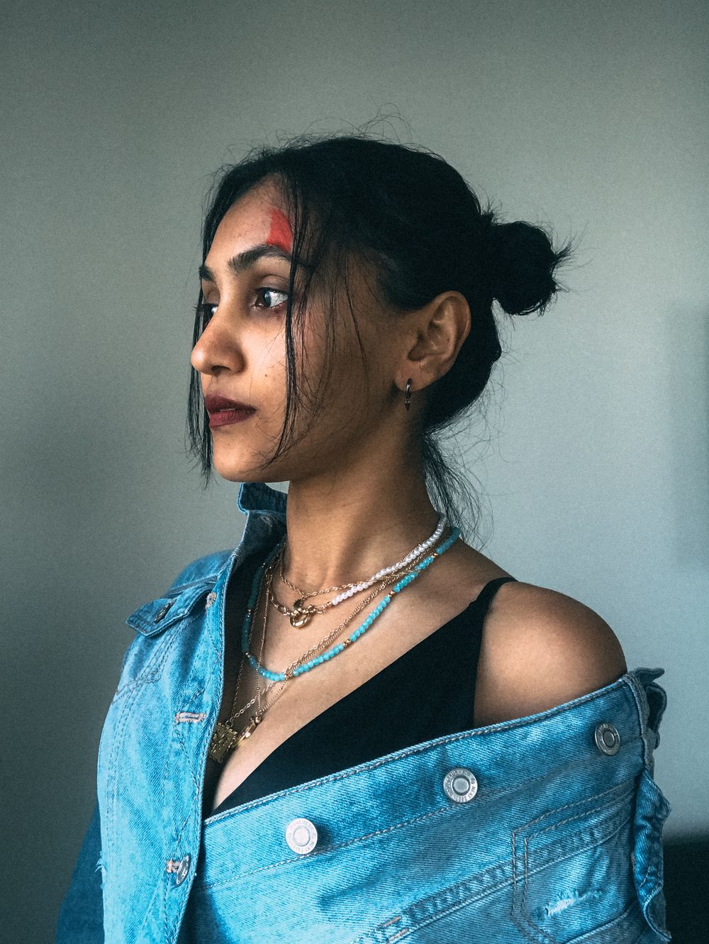 Thriftverse shopper styling a preloved denim jacket