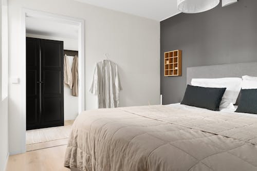 Robe Hanging in an Elegant Gray Bedroom