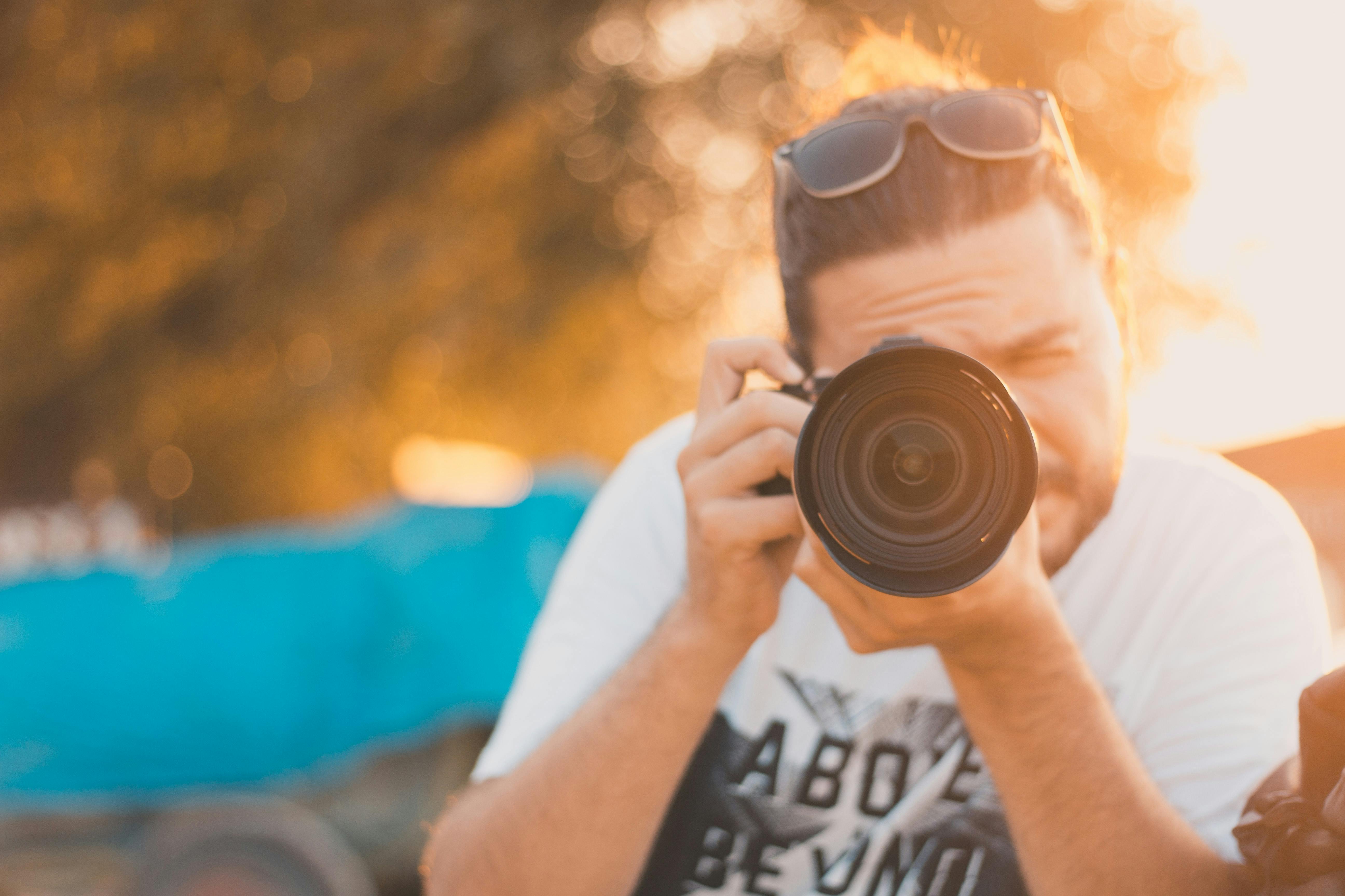 Man Takes Photo With Camera · Free Stock Photo